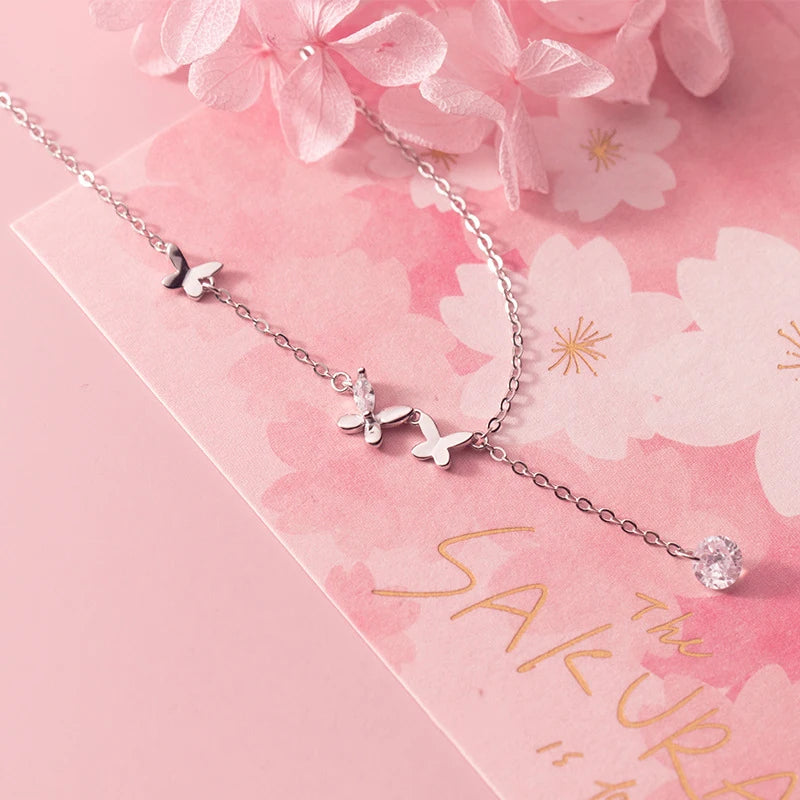 Collar Modian con cadena de eslabones de plata de ley 925 con circonitas y borlas de mariposa danzante para mujer, joyería fina