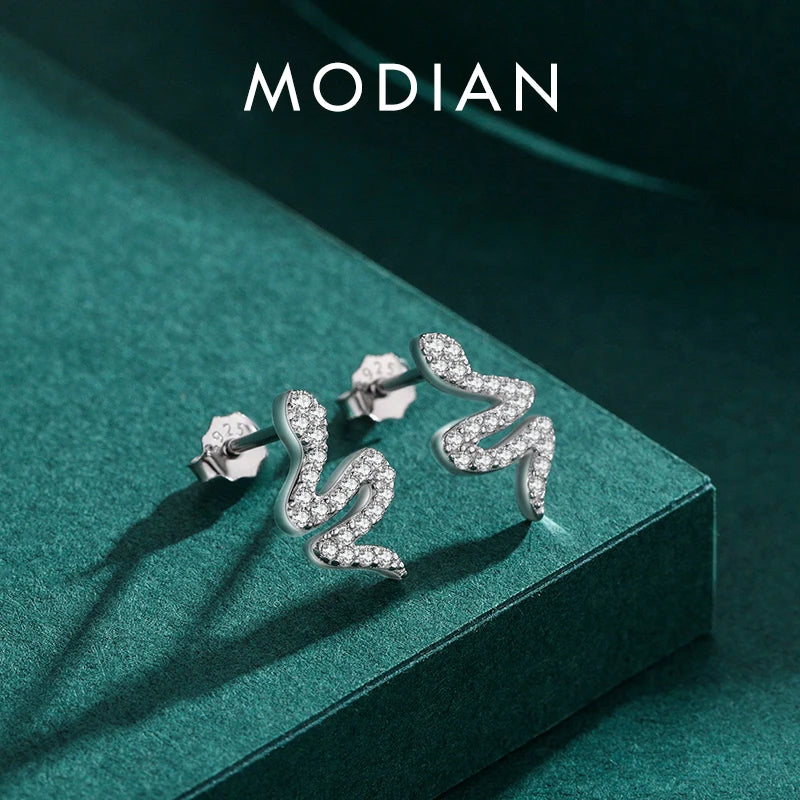 Pendientes MODIAN de plata de ley 925 con circonitas cúbicas brillantes y forma de serpiente para mujer, aretes de animales, joyería moderna y llamativa.